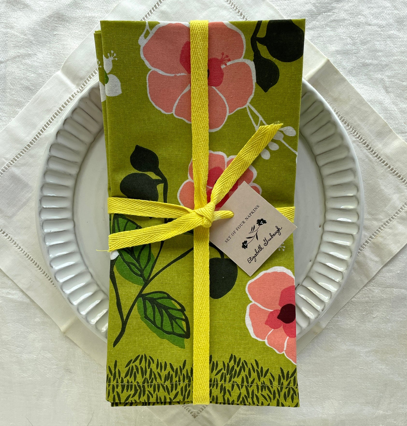 floral cloth napkin set on table